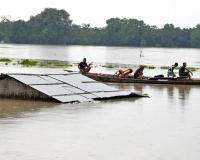 Flood in Assam: असम में नहीं सुधरे हालात, बाढ़ से लगभग 14 लाख लोग प्रभावित, अब तक 99 लोगों ने गंवाई जान