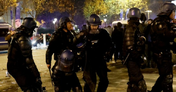 Football team fans and police clash in Paris, 40 people detained